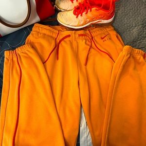 Orange Nike Air joggers